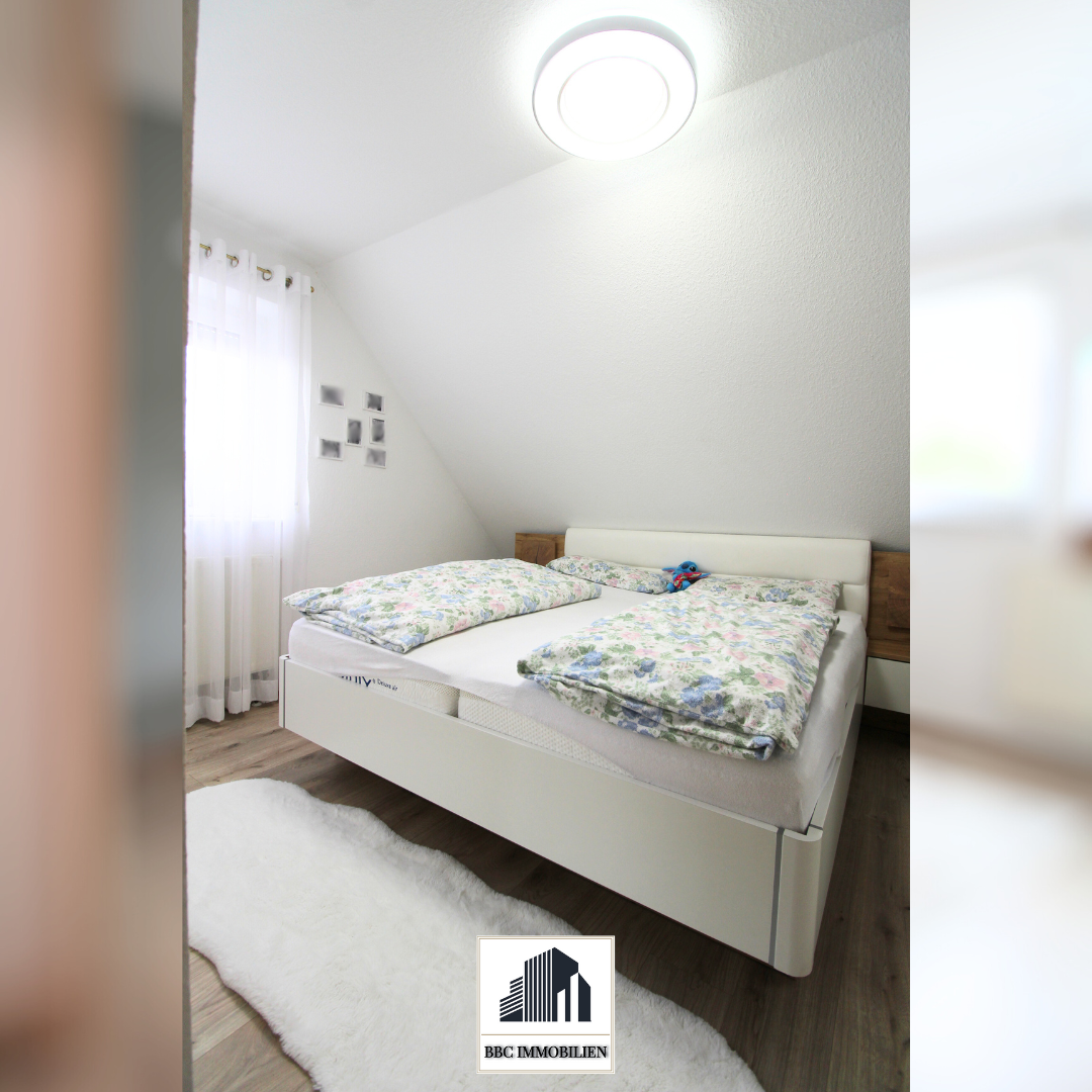 Helle Dachgeschosswohnung mit Balkon, Gartenanteil und Stellplatz in gepflegtem Mehrfamilienhaus!